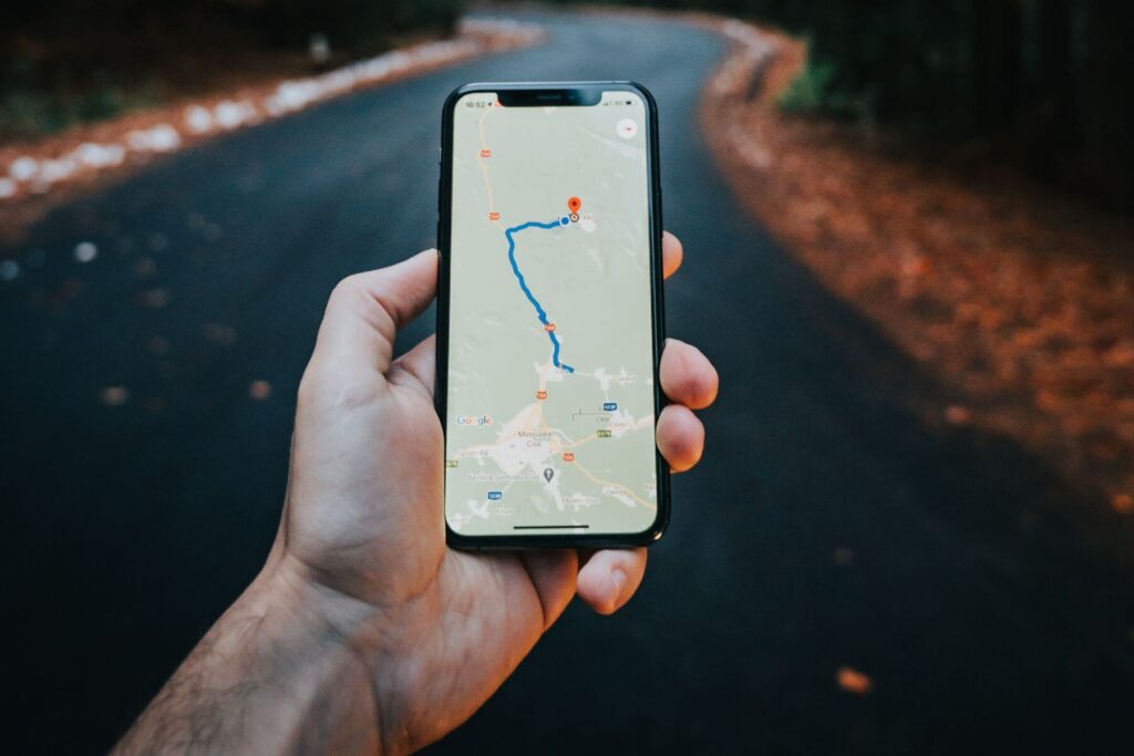 man feeling lost with map on phone