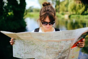 woman with map feeling lost